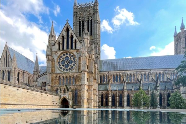 Cathedral Reflection by Clare Bradley - 'Lincoln Cathedral has always been an important landmark  for myself. Even as a small child and seeing it appear in the  distance, you knew you were to close to home. But now as an adult and getting up close and personal with the architectural  wonder, I like to try and see it from as unique a view as possible,  which I feel this photograph shows.' (Lincoln Cathedral)