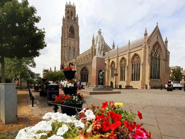 Ann Hawkes - 'Boston in Bloom' at Boston Stump 
St Botolphs church is famously known as ‘Boston Stump’
It is the heart and soul of Boston in Lincolnshire.  The church is thought of as a calendar church. It has 365 steps to the tower, 12 pillars, 7 doors, 52 windows and 24 steps to the library.  Either side of the Chancel is 60 steps taking you to the roof. 