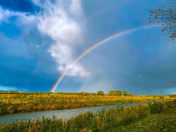 Rachel McHugh - Pocket Full of Rainbows	
I have lived in Spalding since I was born and have always loved the flat fens and views they offer of the skies. I have recently moved along the Vernatts River in Spalding and when I saw this rainbow I had to go outside to take a photo of it.
This image was taken on Miles Bank in Spalding, along the vernatts.